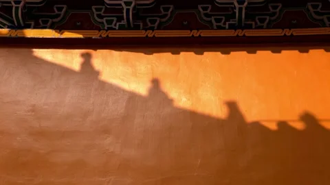 Time-lapse of light and shadow moving on the roof of an ancient Chinese building Stock Footage