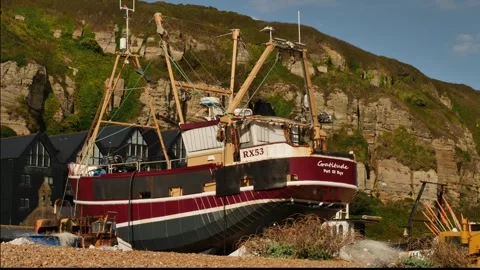 Time lapse light and shadow on a Hastings fishing boat 4K Stock Footage 289487210