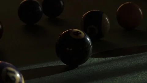 TIme Lapse of Light Moving Across Billiard Balls on Pool Table in 4K Stock Footage 71195526