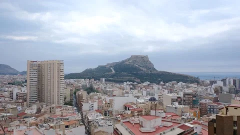 Time-lapse of light passing through clouds with city and castle in the backgr Stock Footage 157365225