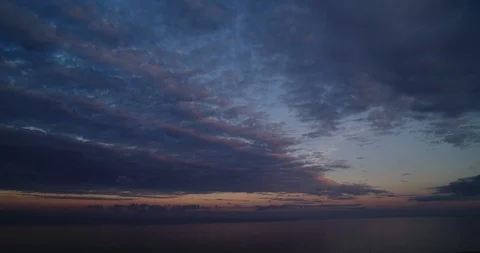 Time-lapse light stretched clouds over evening sky. Stock Footage 103438817