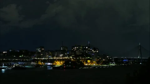 Time lapse lightning over. Sydney citscape and Anzac bridge 4K Stock Footage 168522985