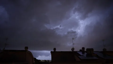Time lapse: lightning in the sky before the storm. Dangerous situation at night Video stock 138446576