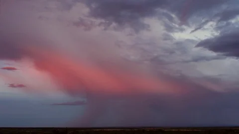 Time-lapse lightning storm over desert, sunset to dark Stock Footage 81194062