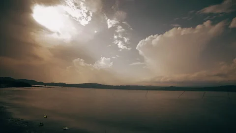 Time lapse of a lightning storms in the clouds as a summer moon rises Stock Footage 259268170
