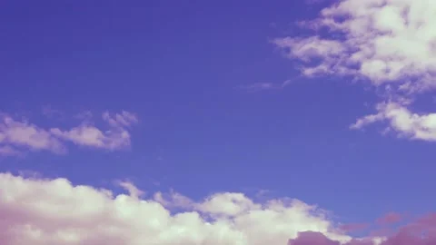 Time Lapse Lilac Sunset Sky with White Puffy Cumulus Clouds. Beautiful Colorful  Stock Footage 220550816