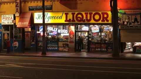 Time lapse liquor store on hollywood boulevard by night at los angeles usa Stock Footage 110955393
