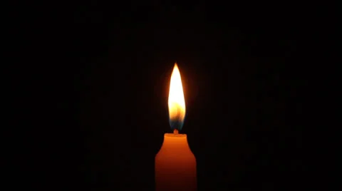 Time lapse of a lit candle while consuming, with black background Stock Footage 34928648