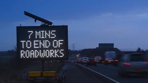 Time lapse live digital sign with traffic updates of roadworks uk Stock Footage 87973357