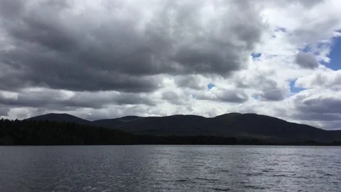 Time Lapse of Loch Morlich and Mountains in the Cairngorms Scotland UK Video stock 86749436
