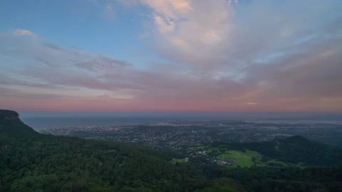Time Lapse Lockdown: Coastal cityscape by sea against cloudy sky-Wollongong, Aus Stock Footage 149228721