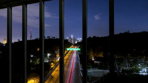 Time Lapse Lockdown Shot Of Illuminated Cars On Road In Modern City Seen From Stock Footage 272619176