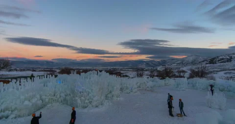 Time Lapse Lockdown Shot Of People Making Illuminated Ice Sculptures From Sunset Stock Footage 160325778