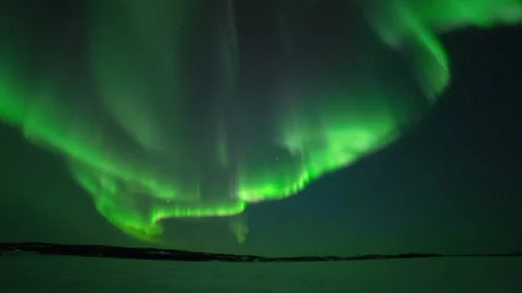 Time Lapse Lockdown Shot Of Snow Covered Landscape Below Aurora Borealis During Stock Footage 160318567