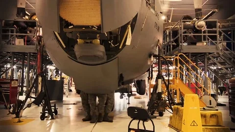 Time-lapse of Lockheed C-130 Hercules aircraft maintenance in hangar - 2017 Stock Footage 92315228