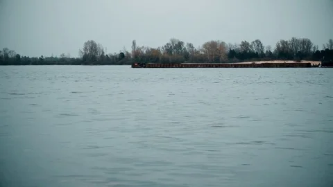 Time lapse of long cargo barge moving on Dnieper river Stock Footage 71064197