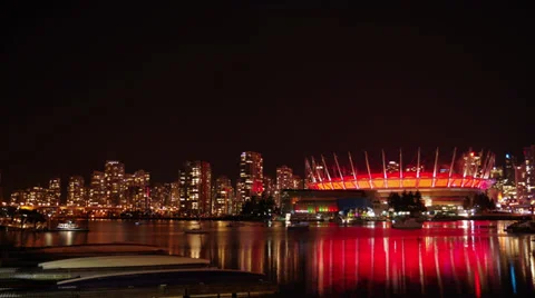 Time Lapse - Long exposure cityscape and water taxis at night Vancouver Stock Footage 32882700