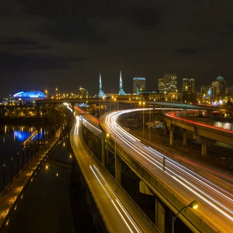 Time lapse of long exposure light trails on freeways in Portland OR at night 4k 動画素材 69543635