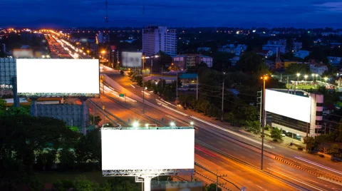 Time lapse long highway and three big billboard day to night Stock Footage 40223166