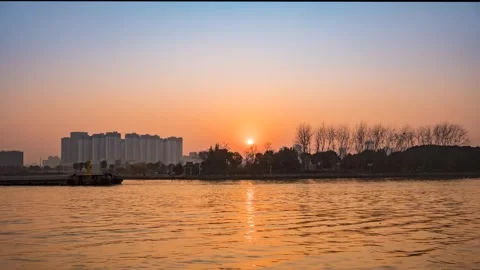 Time Lapse of Long River Sunset Dramatic Sky Color Transition Video stock 319886262