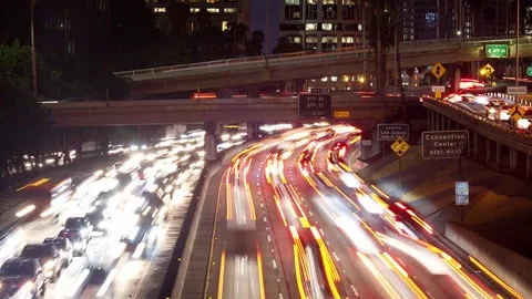 Time lapse long shot of rush hour traffic on the 110 freeway in Los Angeles Stock Footage 83334401
