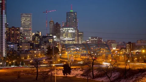 Time lapse long shot of traffic on a bridge and the Denver skyline at dusk Stock Footage 71192168