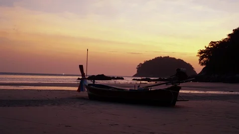 Time lapse long tail boat on the beach Stock Footage 95595305