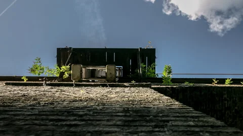 Time lapse looking up brick train bridge at ladder Stock Footage 45722944