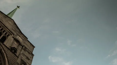 Time lapse looking up at clouds passing swiftly over a church Stock Footage 46192773