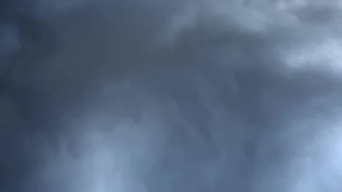 Time lapse looking up into dark gray moody churning storm clouds. Stock Footage 289205523