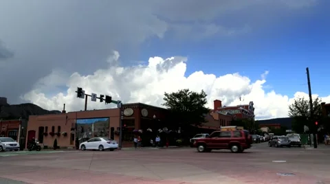 Time Lapse Looking Down City Street with Building Clouds Stock Footage