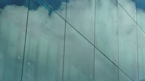 Time lapse, looking up at a glass-covered skyscraper Stock Footage 63452510