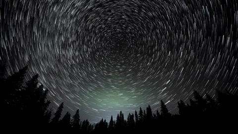 Time lapse looking up into the night sky at the north-star, polaris.  Stock Footage 262884204