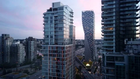 Time lapse of looking out from urban high rise building from dust to evening 스톡 동영상 206002681