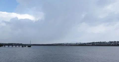 Time-lapse looking over the water in Derry Stock Footage 58510613