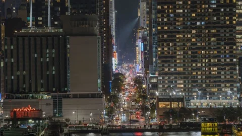 Time-lapse looks down a Midtown Manhattan street canyon toward Times Square 118948499