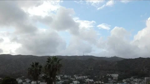 Time lapse Looming clouds over a small town turning from day to night. Stock Footage 174363636