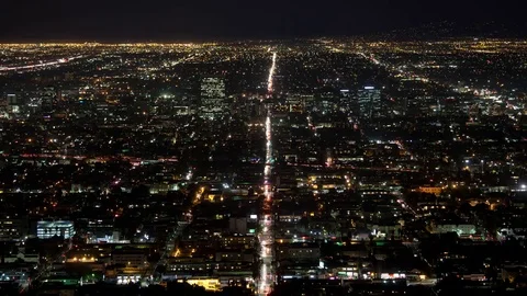 Time lapse of Los Angeles city street traffic from a high angle view at night Stock Footage