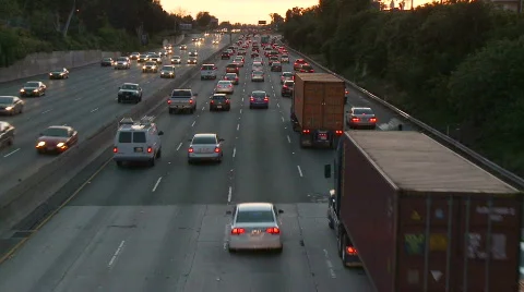 Time Lapse of Los Angeles Freeway Traffic at Sunset Stock Footage 716611