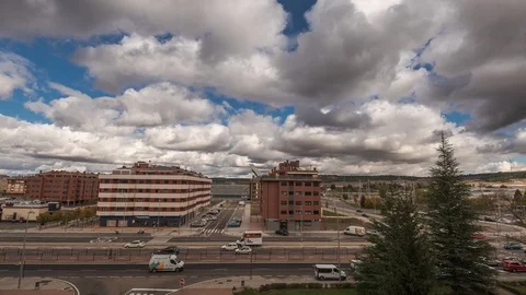 Time-lapse of low clouds in the sky during a cloudy sunny day of winter in a Stock Footage 124225661