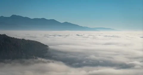 Time-lapse of low inversion fog rolling through the Ljubljana Basin Stock Footage 291711115