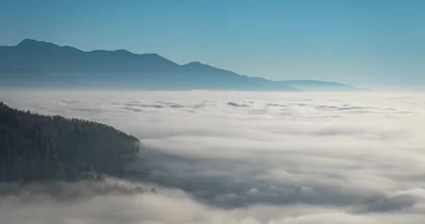 Time-lapse of low inversion fog rolling through the Ljubljana Basin Stock Footage 291711119