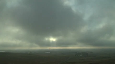 Time Lapse of Low Storm Clouds Clearing Away at Sunset Stock Footage 54730748