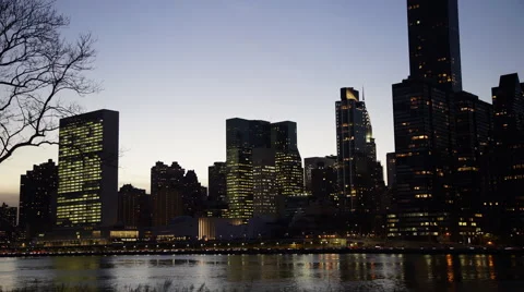 Time lapse of lower Manhattan sunset from Roosevelt Island. Stock Footage 60912980