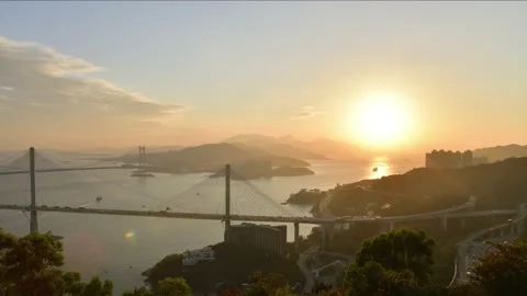 Time-lapse of Ma Wan Channel from Ting Kau under sunset Stock Footage 232395744