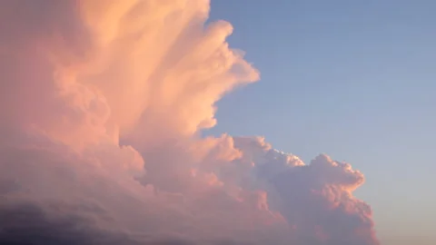 Time-lapse of magical fluffy clouds during a sunset Stock-Footage 144896639