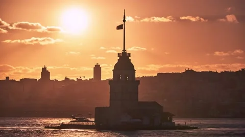 Time lapse of Maiden Tower / Kiz Kulesi at beautiful sunset, Istanbul, Turkey Stock Footage 136916379