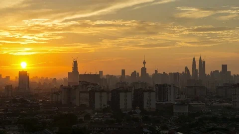 Time lapse of majestic sundown over downtown Kuala Lumpur Stock Footage 80260039