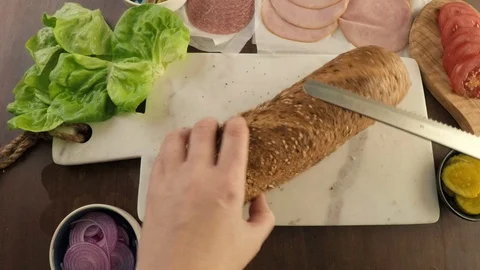 Time-lapse. Making fresh sub sandwich on multigrain bread. Stock Footage