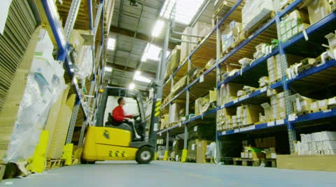 Time lapse of male workers in warehouse preparing goods for dispatch Stock Footage